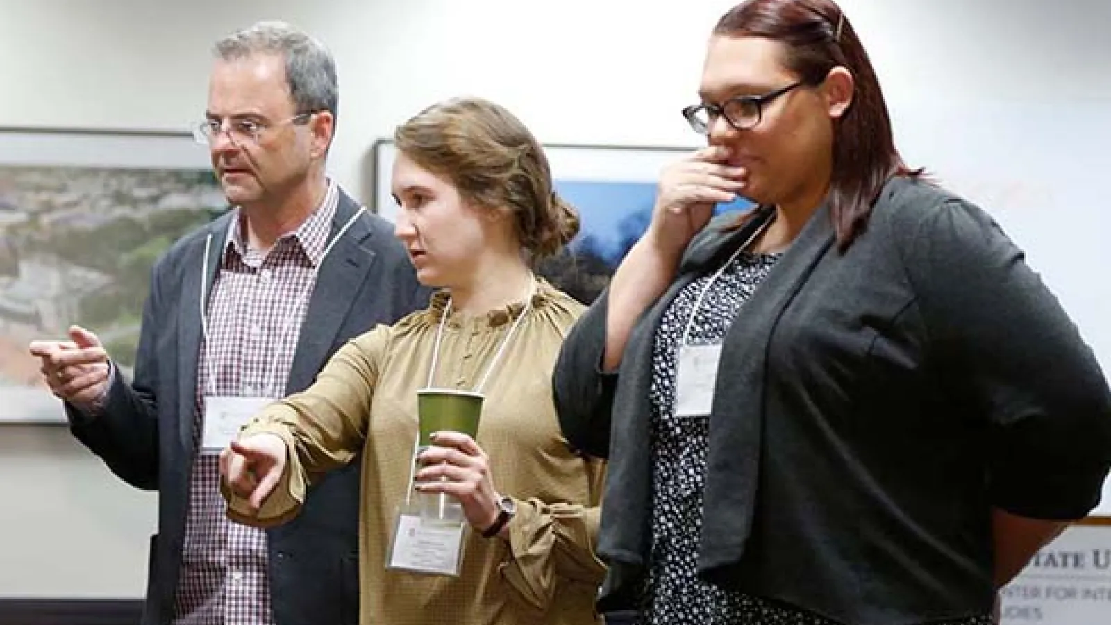 Participants discussing the symposium