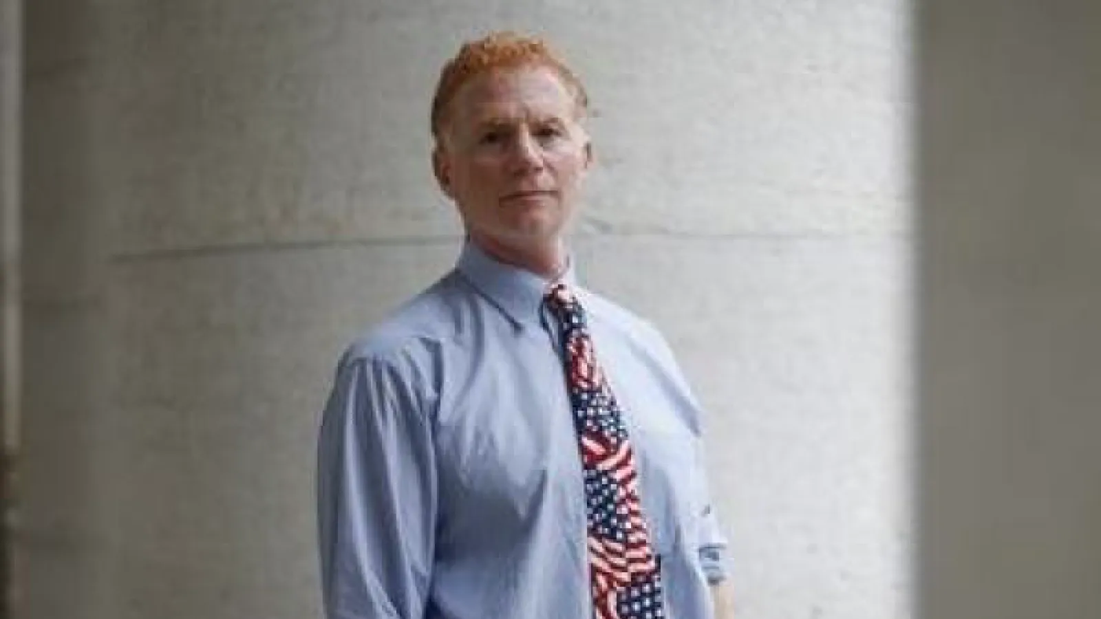 Photo of Mitch Lerner in front of columns