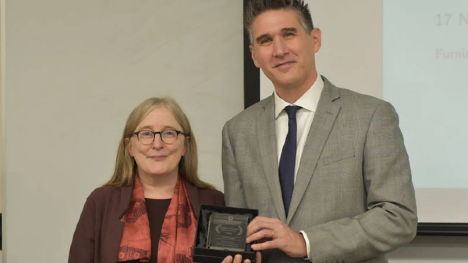 Jason Lyall and Dorothy Noyes, Lyall is holding the 2020 Furniss Book Award