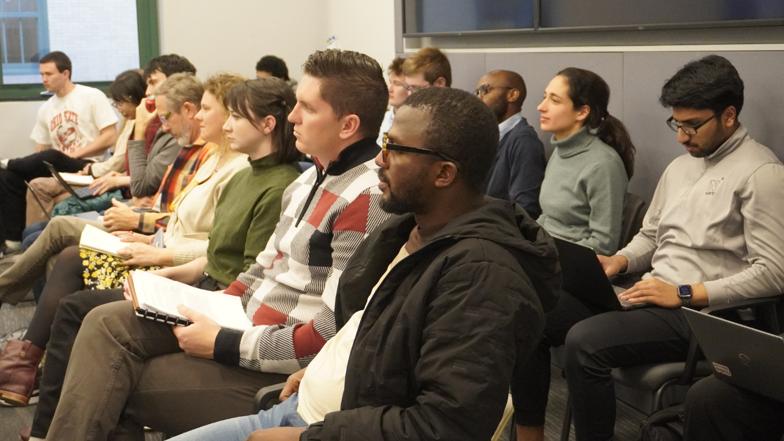 People watching presentation in conference room