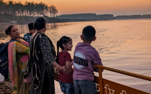 People looking at Ravi River