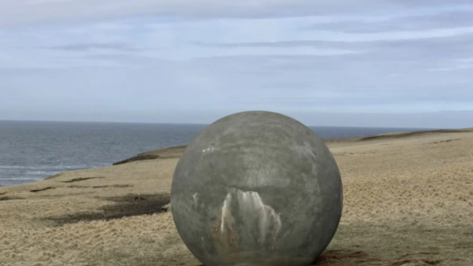 Large round rock on a beach