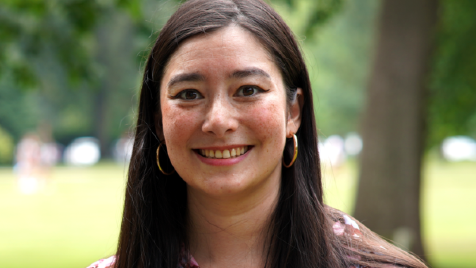 Woman with long, straight brown hair