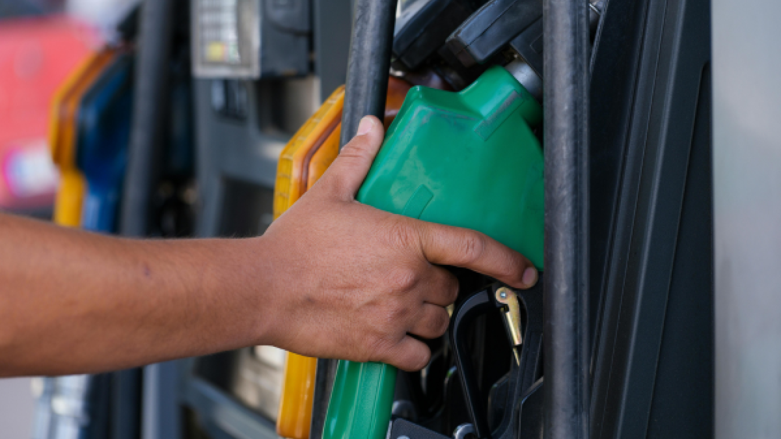 Hand on a gas pump