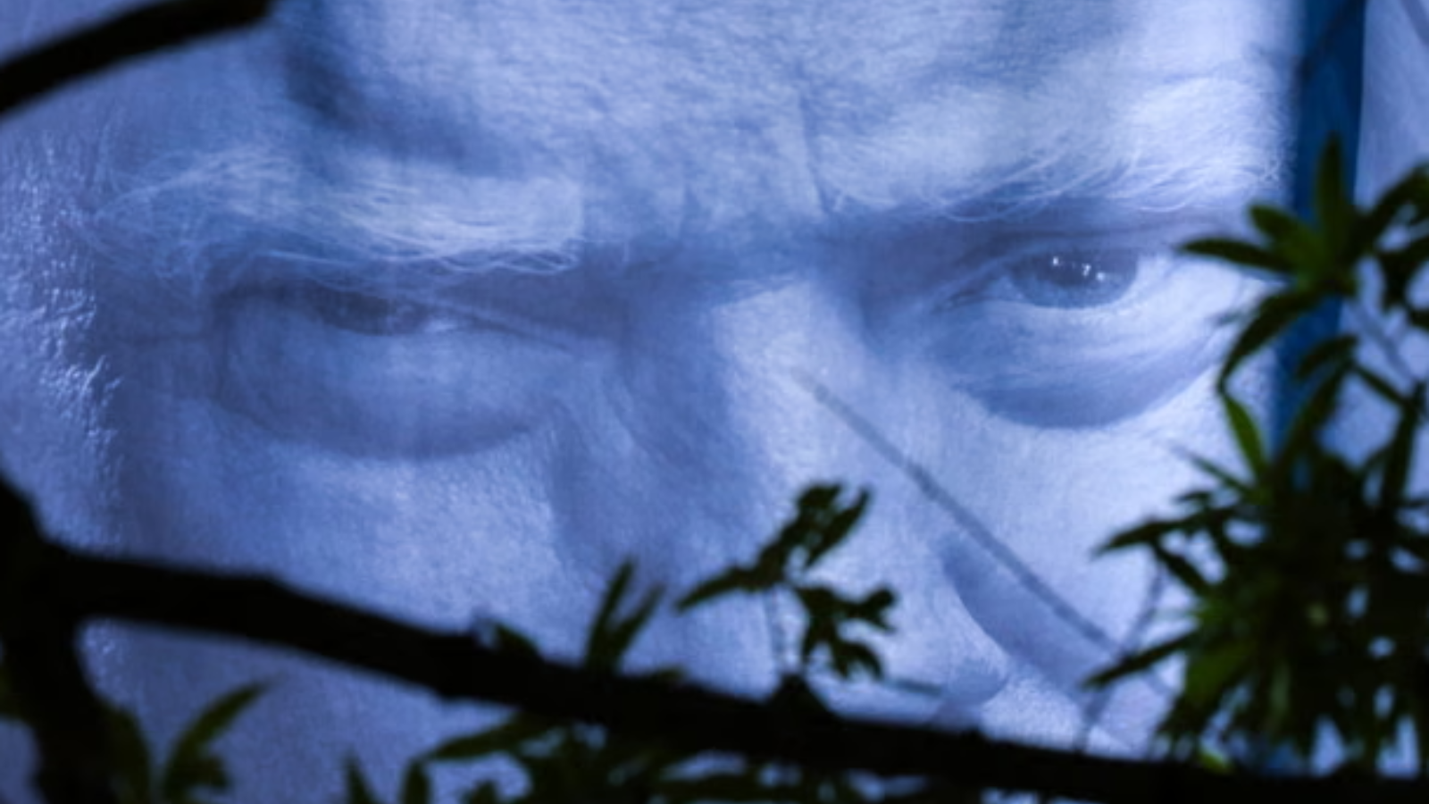 A banner depicting Donald Trump hangs outside the Department of Justice building in Washington DC. 